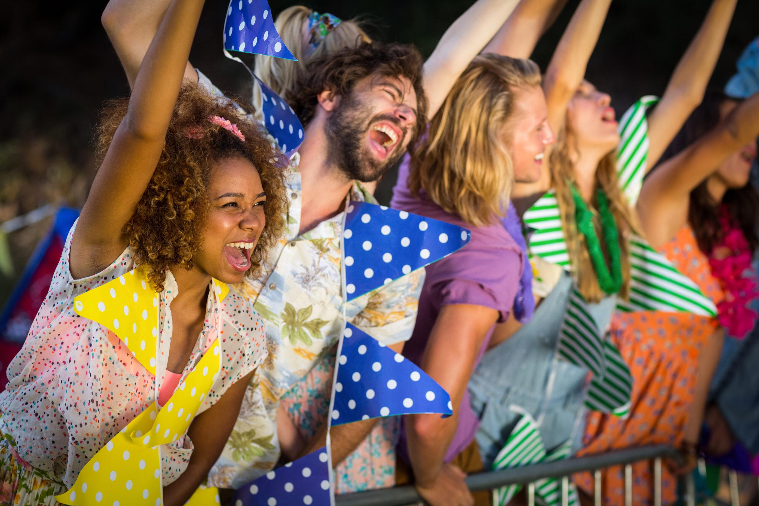 friends-dancing-at-music-festival-in-park-on-a-sun-2026-01-11-10-31-09-utc