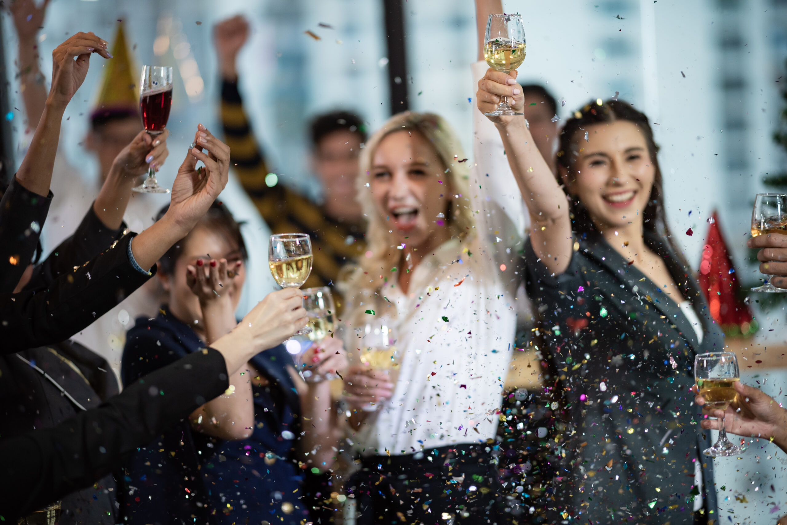 Young business people have fun at a New Year’s party 2020